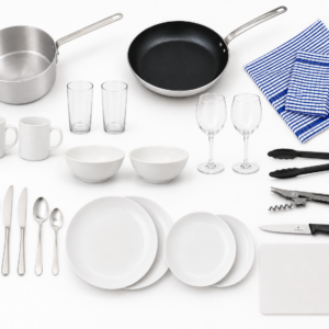 Kitchen Essentials Kit Pro flat lay showing saucepan, non-stick frypan, two dinner plates, two side plates, two bowls, two ceramic mugs, two water glasses, two wine glasses, 16-piece cutlery set, Victorinox vegetable knife, large chopping board, waiter's friend corkscrew, two tongs, and four tea towels on white background